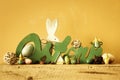 Word Easter in german language with easter bunny eggs and chicks Royalty Free Stock Photo
