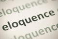 Word eloquence printed on paper macro Royalty Free Stock Photo