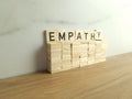 Word empathy made from wooden blocks. Business communication