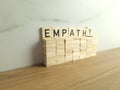 Word empathy made from wooden blocks. Business communication Royalty Free Stock Photo