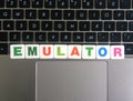 Word Emulator on keyboard background Royalty Free Stock Photo