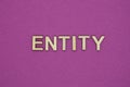 word entity in small square wooden letters