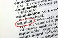 The word equity in a dictionary Royalty Free Stock Photo