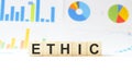 Word ethic made with wood building blocks