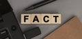 Word FACT made with wood building blocks. Top view Royalty Free Stock Photo