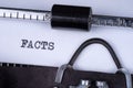 The word Facts written on an old typewriter Royalty Free Stock Photo