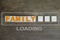Word family made of volumetric colored letters on a dark wooden background, concept of marriage, weddings, honeymoon time, content