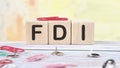 Word FDI written on wooden cubes stock image Royalty Free Stock Photo
