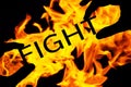 Word fight in the fire Royalty Free Stock Photo