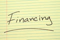 Financing On A Yellow Legal Pad Royalty Free Stock Photo