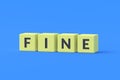 Word fine on yellow cubes on blue background