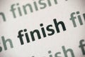 Word finish printed on paper macro Royalty Free Stock Photo