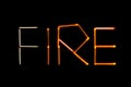 The word `fire`, laid out with matches