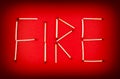 Word FIRE made of matchsticks Royalty Free Stock Photo
