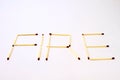 Word fire made out of matches Royalty Free Stock Photo
