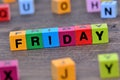 The word Friday on table