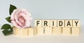 The word Friday on wooden cubes. Weekday