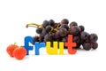 Word Fruit with grapes and strawberry