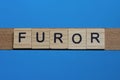 word furor made from wooden gray letters