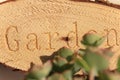 The word garden carved in wood decoration Royalty Free Stock Photo