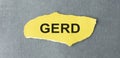 word GERD written on a yellow piece