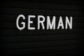 The word German on a Notice Board