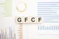 Word GFCF on wooden cubes over bright background with copy space