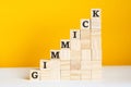 the word gimmick is written on a wooden cubes, concept Royalty Free Stock Photo