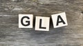 The word GLA which is made from wooden cubes.