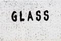 Word glass painted on white brick wall Royalty Free Stock Photo