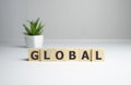 Word Global on wooden cubes, business concept