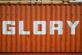 The word Glory written on an industrial container. Royalty Free Stock Photo
