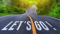 Word Go written on road in middle of an empty asphalt road for business planning strategies and challenges or career path Royalty Free Stock Photo