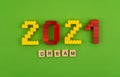 The phrase dream 2021 is lined with wooden letters on a green background. Figures from the constructor top view