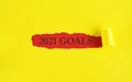 Word 2021 Goals on torn yellow paper background. new year 2021 resolution, setting up goals, targets to achieve concept Royalty Free Stock Photo