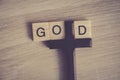 The word GOD written in vintage wood block Royalty Free Stock Photo