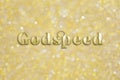 Golden `Godspeed` word on festive background Royalty Free Stock Photo