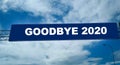 Word GOODBYE 202 on road sign with blue sky and cloud background. coronavirus covid 19 epidemic Royalty Free Stock Photo