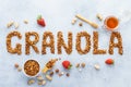 Word granola made of baked oats granola. Background