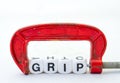 The word grip in a red clamp Royalty Free Stock Photo