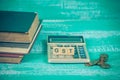 Word of GST on wooden alphabet blocks on calculator .Selective focus,shallow depth of field. Finance and tax Royalty Free Stock Photo