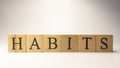 The word Habits was created from wooden cubes. education and work. Royalty Free Stock Photo