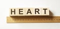 Word HEART made with wooden blocks, business concept