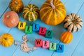 Word Helloween On child's toy cubes and pumpkins Royalty Free Stock Photo