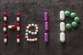 The word Help made out of colorful pills. Medicine and healthy. Royalty Free Stock Photo