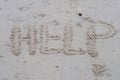 Word help write on the beach. Royalty Free Stock Photo