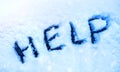 Word Help, written on a snow.