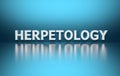 Word Herpetology on blue background