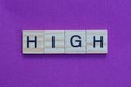 Word high from wooden letters