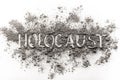 The word Holocaust written in ashes